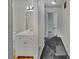 Clean hallway with new carpet and bathroom access at 3805 Stonewall Se Ter # 3805, Atlanta, GA 30339