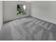Spacious bedroom with new carpet and large window at 3805 Stonewall Se Ter # 3805, Atlanta, GA 30339