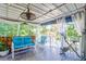 Relaxing covered porch with patio furniture and exercise equipment at 12 Ranger Se Rd, Cartersville, GA 30121