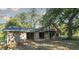 Exterior view of a rustic home needing renovation at 2164 Five Points Rd, Waco, GA 30182