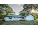 Rear view of a white house needing some TLC at 2164 Five Points Rd, Waco, GA 30182