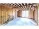 Unfinished basement with exposed wooden beams at 2164 Five Points Rd, Waco, GA 30182