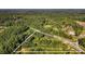 Aerial view of a triangular lot surrounded by trees at 2164 Five Points Rd, Waco, GA 30182