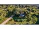 House nestled in a wooded area at 2164 Five Points Rd, Waco, GA 30182