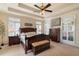 Bright main bedroom with king-size bed and ample closet space at 4068 Andover Cir, Mcdonough, GA 30252