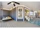 Front porch with seating area, rug, and decorative accents at 4068 Andover Cir, Mcdonough, GA 30252