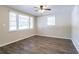 Living room with hardwood floors, neutral walls, and a ceiling fan at 416 Macedonia Se Rd, Atlanta, GA 30354