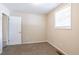 Bedroom with carpet flooring, neutral walls and a ceiling fan at 416 Macedonia Se Rd, Atlanta, GA 30354