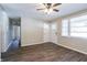 Living room with hardwood floors, neutral walls, and a ceiling fan at 416 Macedonia Se Rd, Atlanta, GA 30354
