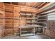 Workshop with wooden walls, shelves, and a workbench at 416 Macedonia Se Rd, Atlanta, GA 30354