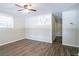 Living room with hardwood floors, neutral walls, and a ceiling fan at 416 Macedonia Se Rd, Atlanta, GA 30354