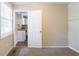Bedroom with access to the kitchen and neutral colored walls at 416 Macedonia Se Rd, Atlanta, GA 30354