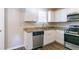 Kitchen with white cabinets, granite countertops, and stainless steel appliances at 416 Macedonia Se Rd, Atlanta, GA 30354