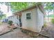 Small house with light-colored siding, a window, and a small porch at 416 Macedonia Se Rd, Atlanta, GA 30354