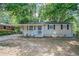 Cute ranch home with covered carport and small front yard at 416 Macedonia Se Rd, Atlanta, GA 30354