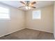 Bedroom featuring a ceiling fan, window with blinds and carpet flooring at 416 Macedonia Se Rd, Atlanta, GA 30354