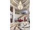 Elegant lobby with grand staircase, chandelier, and marble flooring at 3286 Northside Nw Pkwy # 1005, Atlanta, GA 30327