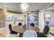 Elegant dining room with large round table and statement art at 3286 Northside Nw Pkwy # 1005, Atlanta, GA 30327