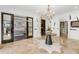 Elegant hallway with a cowhide rug and statement wall at 3286 Northside Nw Pkwy # 1005, Atlanta, GA 30327