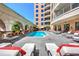Inviting pool area with lounge chairs and surrounding building at 3286 Northside Nw Pkwy # 1005, Atlanta, GA 30327