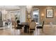 Elegant dining room with a round table and modern chairs at 3286 Northside Nw Pkwy # 1005, Atlanta, GA 30327