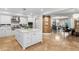 Modern kitchen with white cabinets, stainless steel appliances, and large island at 3286 Northside Nw Pkwy # 1005, Atlanta, GA 30327