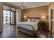 Bedroom with balcony access and stylish decor at 3286 Northside Nw Pkwy # 1005, Atlanta, GA 30327