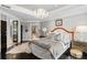Elegant bedroom with a plush bed and hardwood floors at 3286 Northside Nw Pkwy # 1005, Atlanta, GA 30327