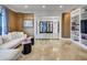 Bright living room with comfortable seating and built-in shelving at 3286 Northside Nw Pkwy # 1005, Atlanta, GA 30327