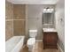 Basement bathroom with tiled shower/tub combo and vanity at 1965 Eagle Valley Ct, Lawrenceville, GA 30043