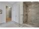 Spa-like bathroom with a large shower and marble tile at 1065 Peachtree Ne St # 3003, Atlanta, GA 30309