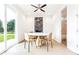 Modern dining area with round table, chairs, and access to a patio at 2029 Memorial Dr # 34, Atlanta, GA 30317