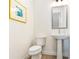 Modern powder room with pedestal sink and white toilet at 2029 Memorial Dr # 34, Atlanta, GA 30317