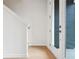 Light entryway with stairs and glass door leading to a deck at 2029 Memorial Dr # 34, Atlanta, GA 30317
