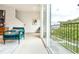 Living room with sliding glass doors to a private balcony at 2029 Memorial Dr # 34, Atlanta, GA 30317