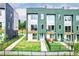 Modern townhome with green exterior and fenced backyard at 2029 Memorial Dr # 34, Atlanta, GA 30317