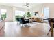 Spacious living room with a leather couch and two teal armchairs at 2029 Memorial Dr # 33, Atlanta, GA 30317