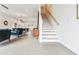 Modern staircase leading to upper level, view of living area at 2029 Memorial Dr # 33, Atlanta, GA 30317