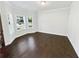 Bright living room with hardwood floors and bay window at 3650 Lindsy Brooke Ct, Douglasville, GA 30135