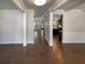 Long hallway view into the kitchen and living areas at 3650 Lindsy Brooke Ct, Douglasville, GA 30135