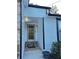 Front entrance with stone steps and a glass door, showcasing a welcoming entryway at 4907 Wycliffe Sw Dr, Stone Mountain, GA 30087