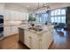 Gourmet kitchen with granite island and stainless steel appliances at 858 Middle Fork Trl, Suwanee, GA 30024