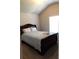 Cozy bedroom with a double bed and window at 689 S Jeff Davis Dr, Fayetteville, GA 30215