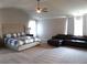 Spacious main bedroom with large bed and sitting area at 689 S Jeff Davis Dr, Fayetteville, GA 30215