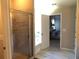 Modern bathroom with walk-in shower and access to bedroom at 689 S Jeff Davis Dr, Fayetteville, GA 30215