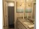 Clean bathroom with granite countertop, single sink, and shower at 689 S Jeff Davis Dr, Fayetteville, GA 30215