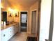 Elegant bathroom with dual vanity, granite countertop, and shower at 689 S Jeff Davis Dr, Fayetteville, GA 30215