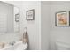 Clean and simple bathroom with white sink and toilet at 174 Hampton Cir, Mcdonough, GA 30253