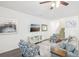 Spacious living room with a staircase, sofas, and a TV at 174 Hampton Cir, Mcdonough, GA 30253