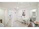 Upstairs hallway with a small study area and bathroom access at 174 Hampton Cir, Mcdonough, GA 30253